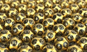 Table Filled from End to End with Golden Mega Millions Lottery Balls