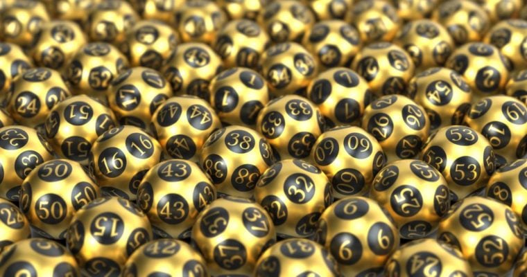 Table Filled from End to End with Golden Mega Millions Lottery Balls