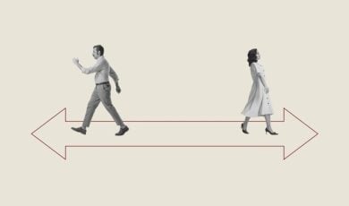 Man and Woman Walk Away in Opposite Direction on Red Arrow
