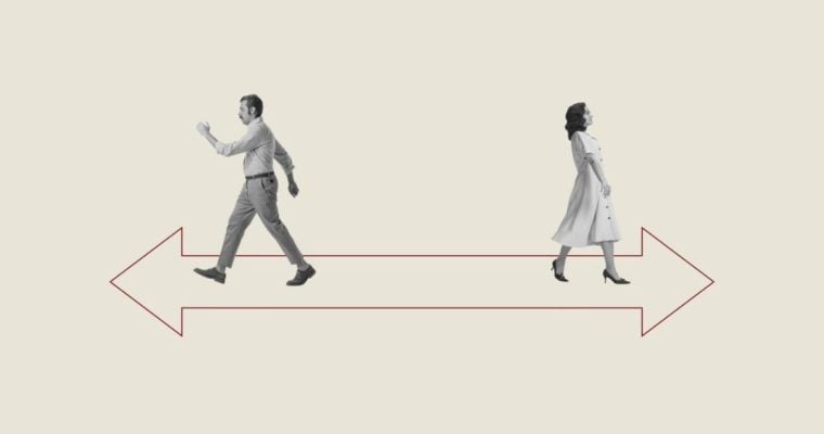 Man and Woman Walk Away in Opposite Direction on Red Arrow