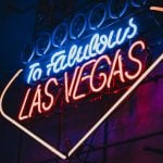 Neon Sign Hangs on Wall and Reads To Fabulous Las Vegas in Red and Blue