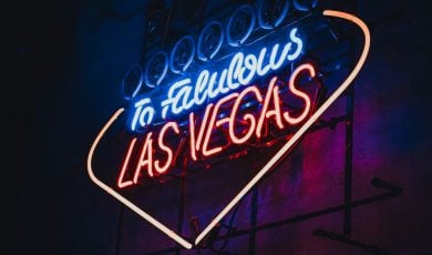 Neon Sign Hangs on Wall and Reads To Fabulous Las Vegas in Red and Blue
