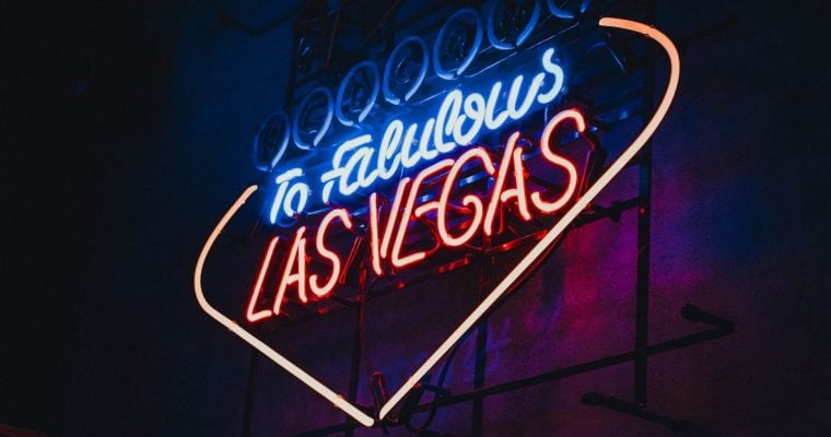 Neon Sign Hangs on Wall and Reads To Fabulous Las Vegas in Red and Blue