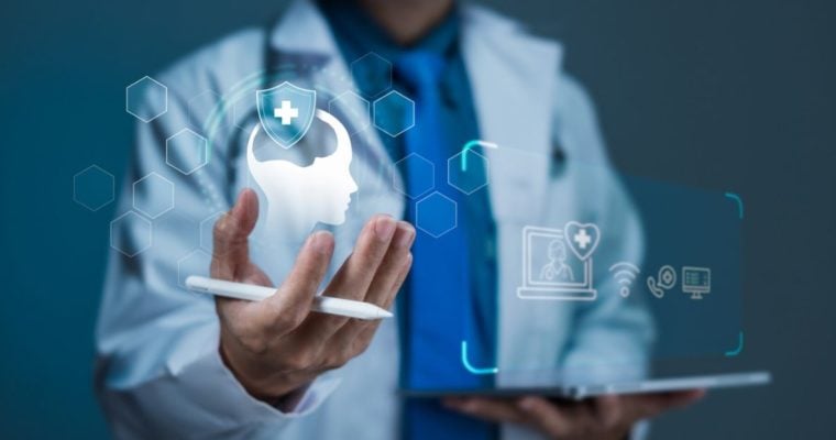 Man in Labcoat Stands Behhind Digital Icons Representing Mental Health and Online Support Services