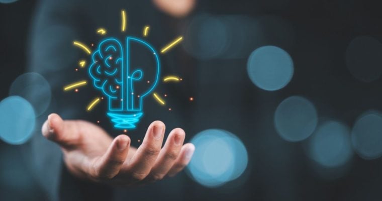Lightbulb Brain Digital Illustration Floating in Man's Hand Represents Good Ideas