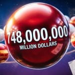 Red and White Lottery Balls Form Shape Like Planet Saturn with Powerball Lottery Ticket Announcing Tonight's Drawing