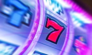 Red 7 in the Middle of a Spinning, Glowing Slot Reel