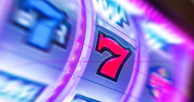 Red 7 in the Middle of a Spinning, Glowing Slot Reel