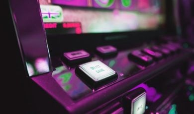 The Michigan Gaming Control Board says it seized three suspected illegal slot-style machines, gift cards, and cash from a Muskegon bar.