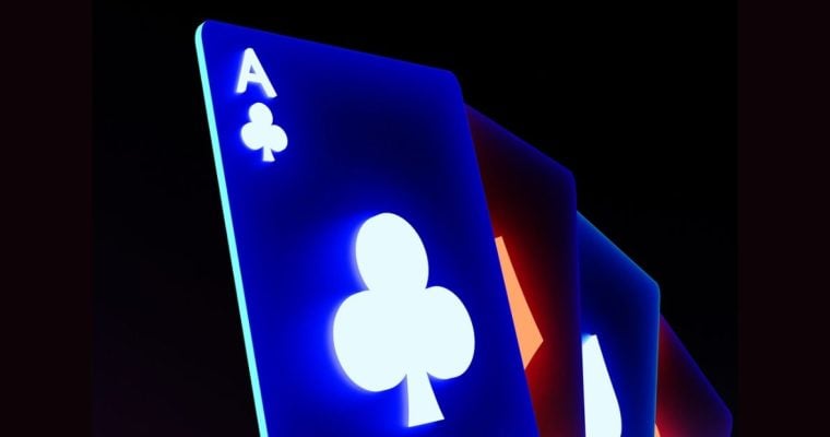 Blue Neon-Lit Ace of Clubs Playing Card Sits In Front of 3 Others