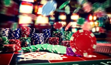 Flying Poker Chips and Stacks On Top of Casino Game Table