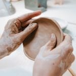 Clay Workshop With Woman Making Small Ceramic Plate