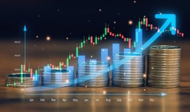 Digital Overlay of Rising Bar Graph Over Image of Stacked Silver Coins