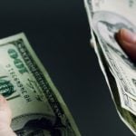 Prosecutors say a woman with power of attorney diverted about $118,921 from a 94-year-old woman, most of it spent on online gambling.