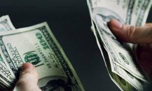 Prosecutors say a woman with power of attorney diverted about $118,921 from a 94-year-old woman, most of it spent on online gambling.