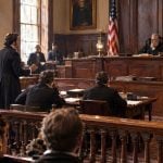 A Lively Courtroom Filled With People Set in 1852