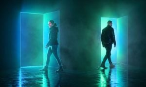 Bright Blue/Green Doors in Dark Room with Two People Going Opposite Directions