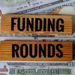 Funding Rounds Wood Blocks on American Banknotes