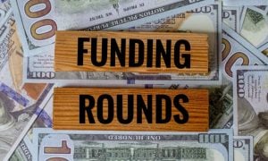 Funding Rounds Wood Blocks on American Banknotes