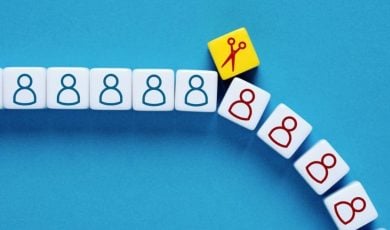 Scissors Icon Separates Small White Blocks with Human-Shaped Figures in Blue and Red