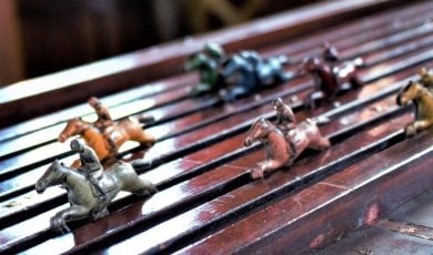 A MA proposal to allow historical horse racing devices is facing opposition from casino operators, which warn of revenue and job losses.