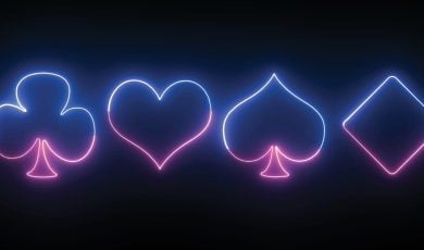Club, Heart, Spade and Diamond Shape in Neon on Black Background