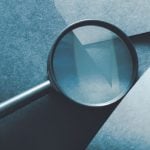 Abstract Image of Magnifying Glass Represents Scrutiny and Investigation