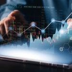 Complex Upward Trending Data Graph Overlays Image of Man Using Tablet on Table