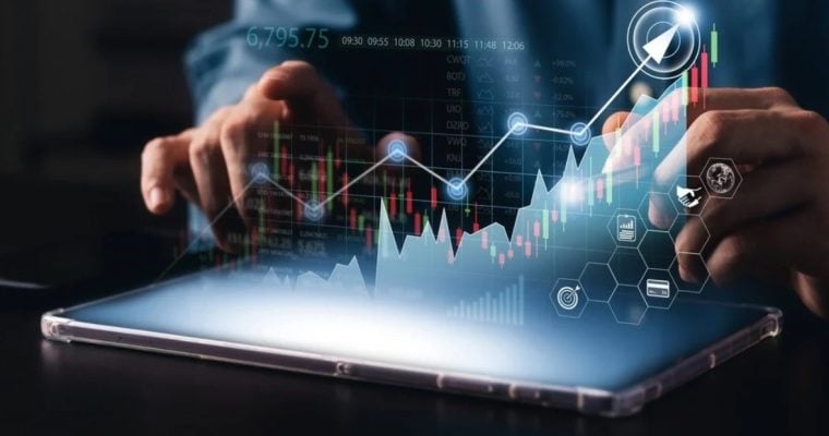 Complex Upward Trending Data Graph Overlays Image of Man Using Tablet on Table