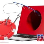 Fishing Pole Comes Out of Laptop Screen with Red Hole and Poker Chips Around