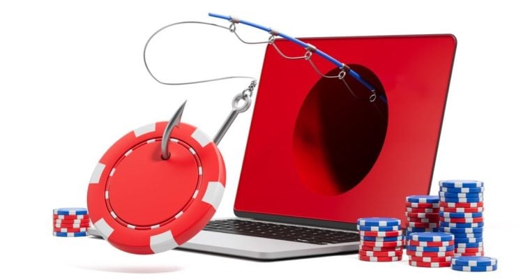 Fishing Pole Comes Out of Laptop Screen with Red Hole and Poker Chips Around
