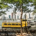 Yellow Water Taxi Sits in Hudson River at Battery Park in NYC